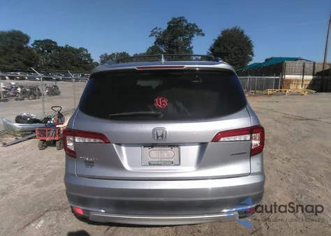 2021 Honda Pilot 2Wd Touring 7 Passenger z USA, uszkodzony, nr VIN 5FNYF5H69MB000710